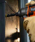 Impact Rated 11-in-1 Multi Bit Screwdriver And Nut Driver With Phillips Slotted Square And Torx Bits in use on metal panel