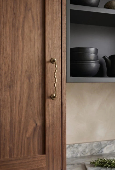 Brushed Antique Brass Wavy Cabinet Pulls With Five Inch Hole Centers go to kitchen cupboards and dresser vanities