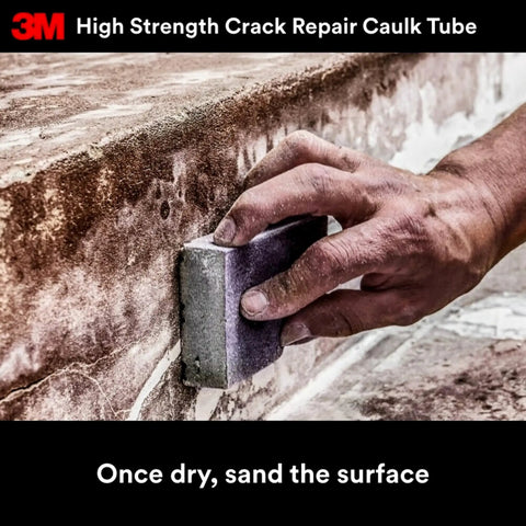 Hand sanding a crack filled with Heavy Duty Crack Repair For Walls And Ceilings, 7 Oz Squeeze Tube With Precision Tip