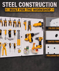 Game Changer Garage Wall Storage System With Four 12X16 Pegboard Panels Six Crystal Clear Bins And Thirty Six Heavy Duty Hooks in use with various tools.