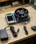 Powerful 150W CNC Electronic Load for Battery Capacity Testing 0 to 150V and 20A DC Load Tester With 4 Wire Kelvin Sensing 2.4 Inch Color Display CC CV CP CR Modes OVP and OTP Protection on workbench with cables