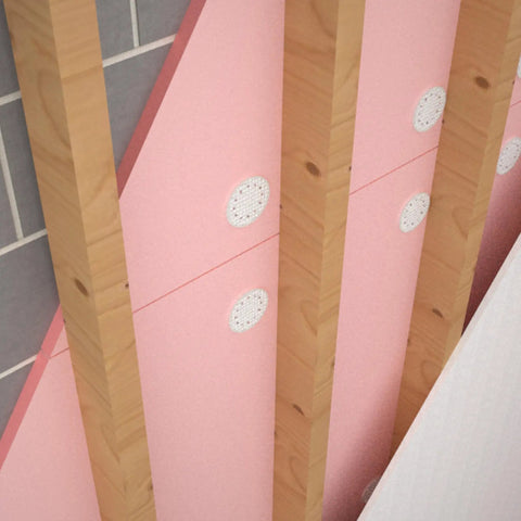 Rock Solid White Plastic Insulation Anchors 250 Pack Heavy Duty Fasteners For Masonry Brick Concrete Stone Walls Zero Thermal Bridging Easy Hammer Install Lock In Thick Foam Boards Now securing pink foam board on wooden framing.