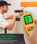 GYZOUKA Wall Scanner Stud Detector for Wood Metal Live AC Wire Locating in use, detecting live wires while drilling.