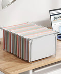 Top Shelf Letter Size Hanging File Folder Frame Slick Desk Organizer With No Hassle Adjustable Cabinet Rails For Crisp Office Storage Heavy Duty Build Quick Setup Keep Papers Neatly Secured on a desk with colorful hanging folders.