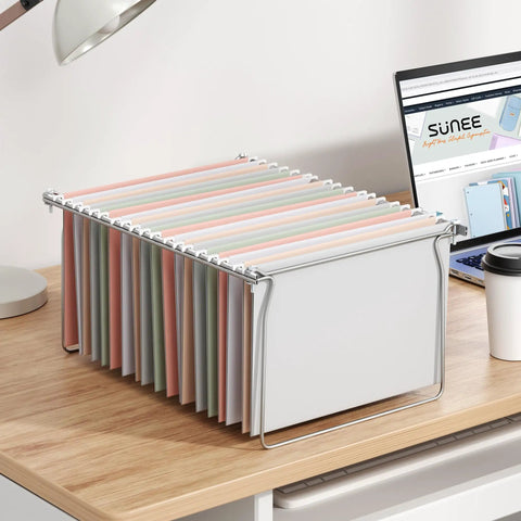 Top Shelf Letter Size Hanging File Folder Frame Slick Desk Organizer With No Hassle Adjustable Cabinet Rails For Crisp Office Storage Heavy Duty Build Quick Setup Keep Papers Neatly Secured on a desk with colorful hanging folders.
