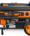 Heavy Duty 4750 Watt Portable Generator With Electric Start And Wheel Kit Built Tough For Campouts And Backyard Emergencies features a durable frame and electric start.
