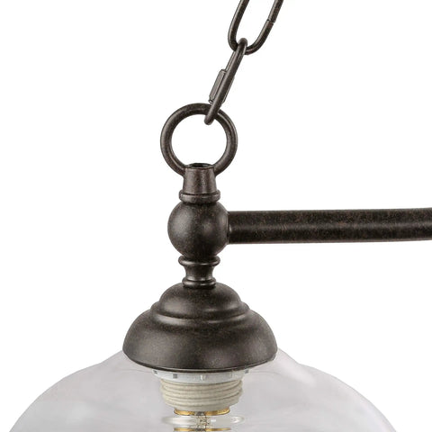 Close-up of chain and bulb housing on Farmhouse Chandelier Hanging Light Fixture in rustic black metal with clear glass shade
