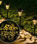 Garden view of 6 Pack Solar Pathway Lights with Upgraded Metal Garden Stakes Warm White LED Ideal For Yard Lawn Walkways Patio And Garden