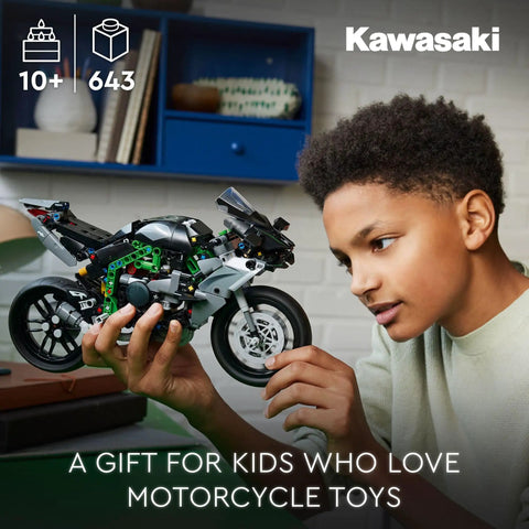 Boy holding Ninja H2R Inspired Kawasaki Motorcycle Model Kit with Stand for Kids Ages 10 and Up Realistic Detail 1 8 Scale