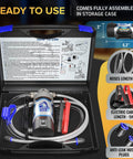 Front view of Harpy Eagle electric oil extractor pump kit in an open storage case with hoses and clamps.