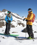 Skiers on snow with 30L Ski Tour And Mountaineering Backpack Built For Powder Days With Weatherproof Breathable Fabric