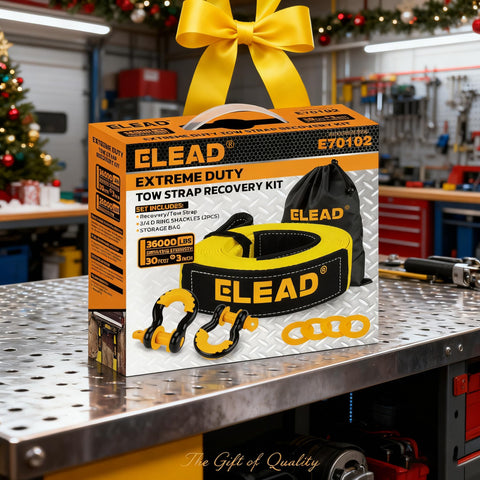 Beefed Up 3 Inch By 30 Foot Tow Strap Recovery Kit With Two Three Quarters Inch D Ring Shackles For Trucks SUVs Set on shelf.