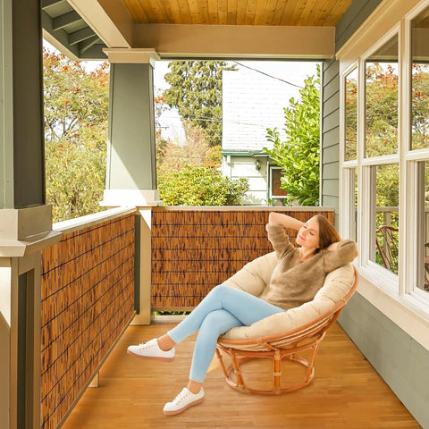Natural Reed Bamboo Fencing Light Russet For Outdoor Privacy Screen on balcony with chair and greenery