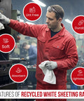 Man cleaning machine with recycled white sheeting rags displaying lint-free, soft, durable qualities in workshop.