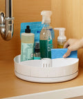 Under Sink Turntable Organizer With Adjustable Dividers, Lazy Susan For Kitchen Or Bathroom Storage, 360 Degree Rotation With Smooth Stainless Steel Bearings, 12 Inch Diameter, White, holding cleaning supplies under a sink.