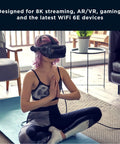 Person using VR headset on yoga mat with Q14 Tri Band Mesh WiFi 6E System With Lightning Fast Speeds Up To 5.4 Gbps For 100 Plus Devices