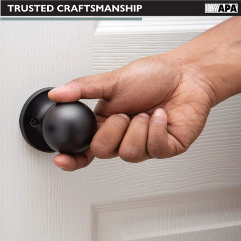 Hand installing Oil Rubbed Bronze Interior Passage Door Knobs 10 Pack Ball Style Non Locking For Hallways Closets And Pantries