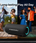 Portable Bluetooth Speaker With 40W Peak Power And Deep Bass From Dual Passive Radiators on table with dancing people