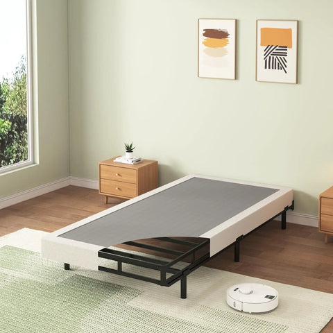 Twin Box Spring Low Profile Heavy Duty Platform Mattress Foundation on display in a minimalist room with light decor.