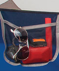 Internal mesh pocket of Sundome Camping Tent With Rainfly For Two To Six People, showing storage with sunglasses and small items.