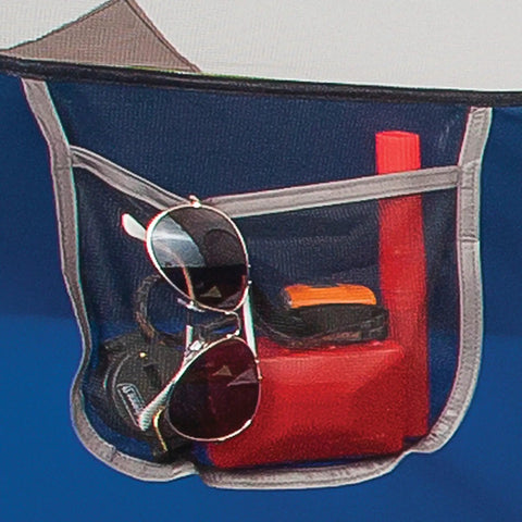 Internal mesh pocket of Sundome Camping Tent With Rainfly For Two To Six People, showing storage with sunglasses and small items.