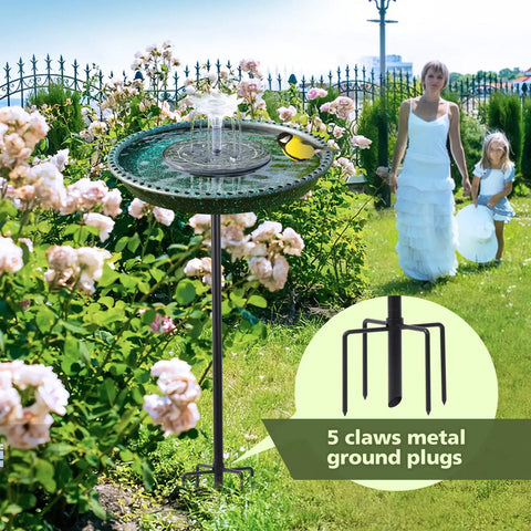 Solar Powered Bird Bath Fountain With Lotus Flower Nozzle And Five Prong Stake Base in garden setting attracting birds.