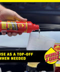 Severe Instant Quiet Lubricant For Engine Transmission And Power Steering Kills Knocks And Ticks Reduces Friction Prevents Wear Ideal For High Mileage Cars 8 Oz Bottle 6 Pack, pouring into measuring cup