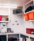 Ceiling Mounted Forced Air Unit Heater With 50000 Btu Dual Fuel Propane Natural Gas For Garages Workshops Kicks Serious Heat Up To 1667 Sq Ft Low Profile Design installed in a garage.