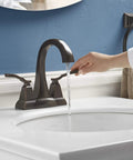 Person operating Ridgeport Centerset Lav Faucet For Bathroom Sink With Easy Install Durable Chrome Finish Two-Handle Operation