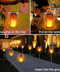 Sun Powered Solar Torch Lights Outdoor Flickering Flame 3 In 1 Detachable Hanging Lanterns No Wiring Auto On Off IP65 Waterproof Tiki Torches For Garden Path Patio Yard Decor 6 Pack shown hanging, on table, and inserted in ground