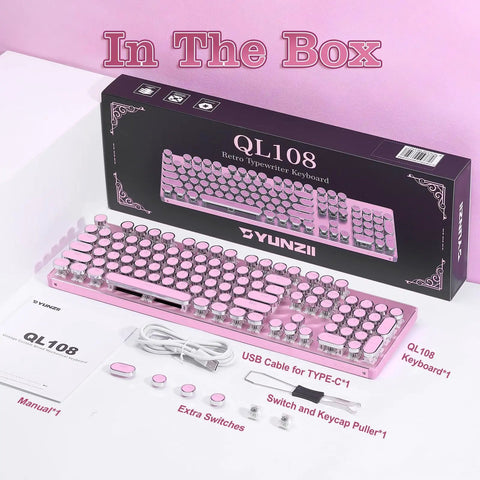 In the box of Pink Retro Mechanical Gaming Keyboard Boss Level Design Featuring Classic Typewriter Layout and Solid Steel Chassis.