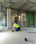 Construction worker using GLL 55 Self Leveling Cross Line Laser With Visimax Technology Delivers Bright Line Visibility On Real Jobsites