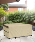 Heavy Duty Outdoor Patio Furniture Cover For Rectangular Tables And Chairs, Waterproof 600D Canvas Protector shown installed over furniture on patio.