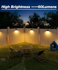 12 Pack Solar Fence Lights IP65 Waterproof Outdoor Lighting With Warm White And RGB Color Modes illuminating backyard fence