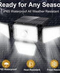 Cordless Outdoor Solar Flood Lights With 270 LED And 3000LM Motion Sensor IP65 Waterproof 4 Heads illuminated in rain