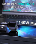 Straight Fire 300W Usb C Car Charger With Six Ports Smart Pd 3 1 Fast Charging Adapter on laptop keyboard showing 140W max output.