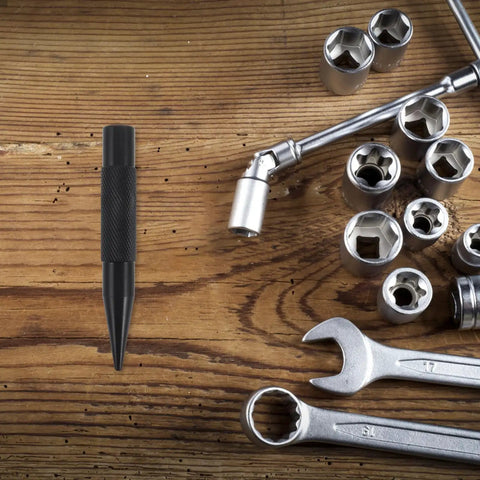 Tough As Nails Auto Body Hammer And Car Dent Repair Pen For Quick Panel Fixes Effortlessly Smoothing Sheet Metal Dings On Your Daily Driver Rig With Durable Steel Build Black on a wooden surface.