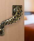 Octopus Door Handle With Dope Tentacle Look And Heavy Duty Pull Bronze Finish Made From Premium Polyresin on a wooden door