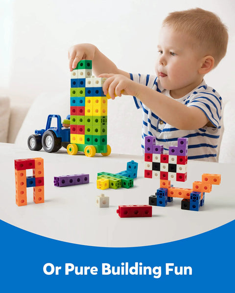 Child playing with Hands On Math Manipulatives Kit For Kids Ages 3 To 8 With 100 Colorful Counting Cubes In Ten Colors