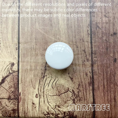 White Ceramic Round Kitchen Cabinet Knobs 10 Pack With Long And Short Screws For Drawers Cabinets Dresser Wardrobe Closet Vintage Style Hardware That Feels Great In The Hand resting on wooden surface