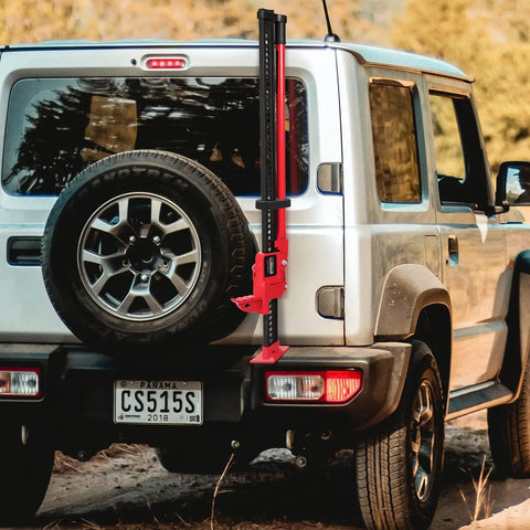 Rust-Resistant Hi-Lift Jack Handle Keeper Accessory Upgrade Bar Protector mounted on SUV rear for secure transport.