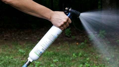 Slick Inline Water Filter With Durable Hose Shield Engineered For Dope Hydroponics Grow Sets And Legit Backyard Gardens spraying water.