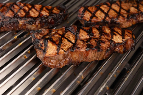 Grilled steaks on Stainless Steel V Shaped Grill Grid Replacement For Regal And Imperial Grills, 19.25 Inches By 6.21 Inches