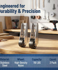 Built Tough Vertical Track Roller Wheels For Barn Doors And Cabinets Zero Wiggle Bottom Slide Guides With Rubber Treads Keeps Heavy Doors Running Smooth Without Sagging Set Of Two on a workbench.