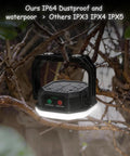 Go To Rechargeable Solar Camping Lantern with 6600mAh Battery, 4000 Lumens, hanging wet showing IP65 waterproof in the rain