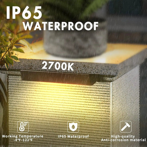 Close-up of LED retaining wall light on masonry, highlighting 2700K glow, IP65 waterproof, in rainy condition.