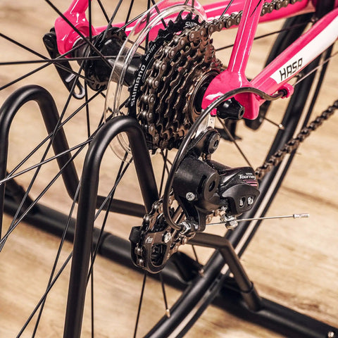 Close-up of Heavy Duty Bicycle Floor Parking Rack Stand For Mountain And Road Bikes Indoor Home Garage Storage Stable Vertical 3 Bike Holder