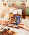 Hands assembling DIY Book Nook Kit European Arcade Street Scene With LED Lighting 3D Wooden Puzzle Miniature House