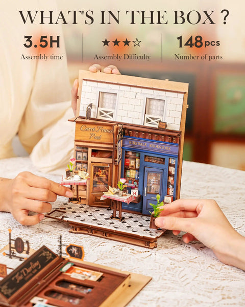 Hands assembling DIY Book Nook Kit European Arcade Street Scene With LED Lighting 3D Wooden Puzzle Miniature House