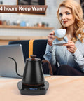 Woman enjoying tea next to a Gooseneck Electric Kettle With Smart Temperature Control, 0.9L Stainless Steel Interior, 1000W Fast Heat, Black